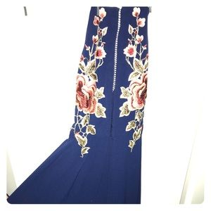 This gorgeous dress is a one piece with shorts